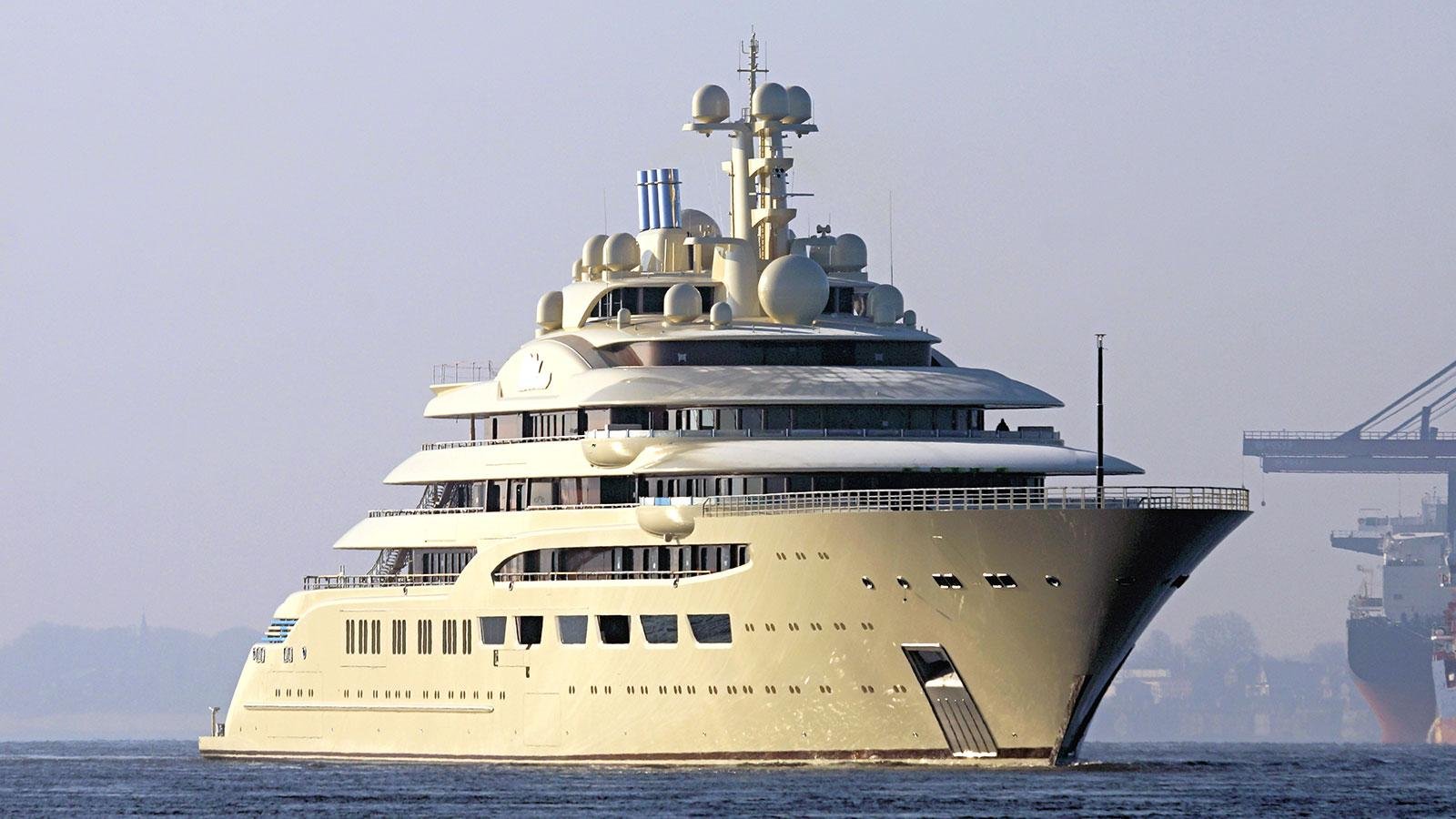 dilbar yacht next to cruise ship