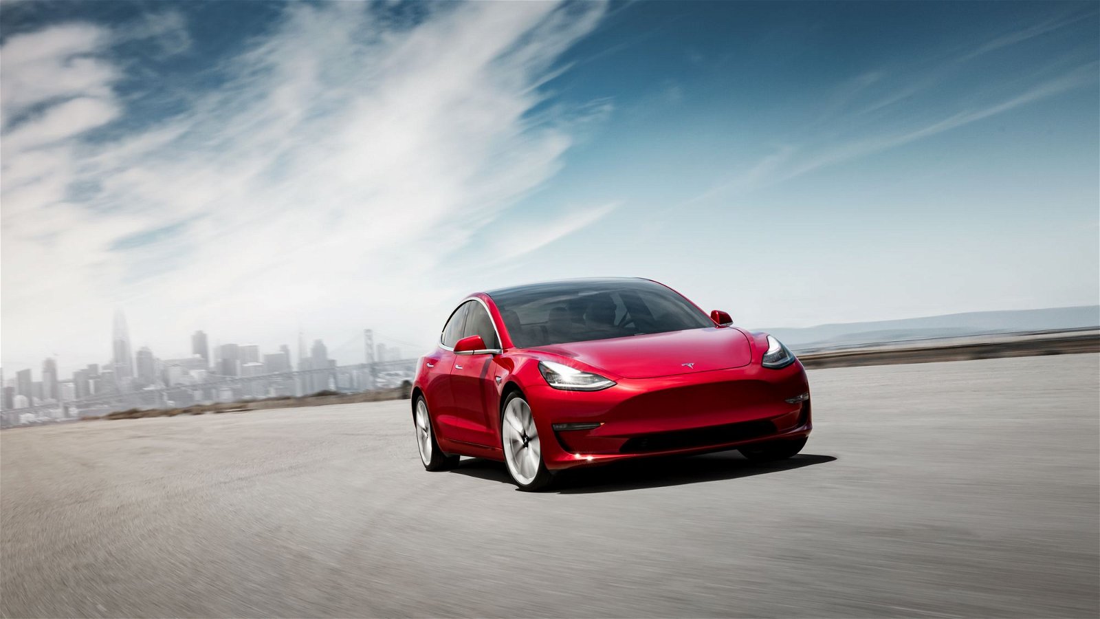 Model 3 Performance - Red Front Motion - SF Skyline